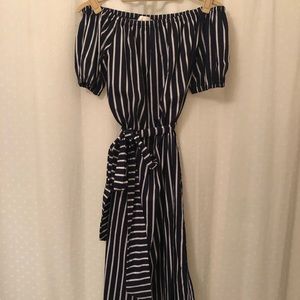 Off the shoulder dress with belt.